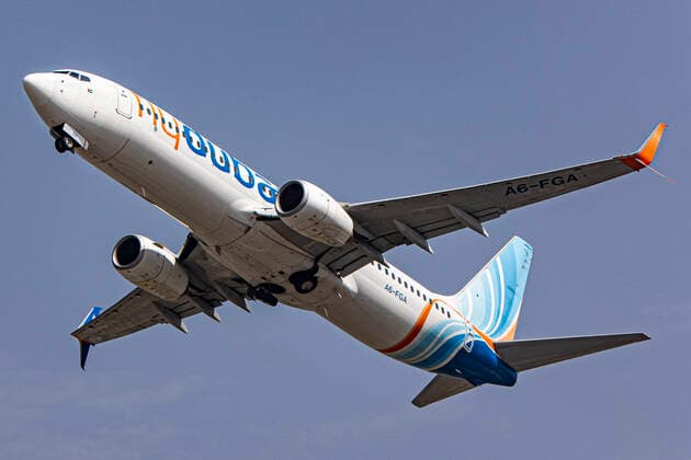 Flydubai Boeing 737-800 Taking Off From Kathmandu Airport Flydubai Boeing 737-800 aircraft as seen during takeoff and flying phase as it departs from the Nepali capital, Kathmandu Tribhuvan International Airport KTM. The B737 passenger airplane has the registration A6-FGA and is powered by 2x CFMI jet engines. Flydubai or Dubai Aviation Corporation is an Emirati government-owned low-cost airline based in Dubai in UAE United Arab Emirates. Kathmandu, Nepal on April 2022 Kathmandu Nepal  Copyright: xNicolasxEconomoux originalFilename: economou-flydubai220416_npHpc.jpg