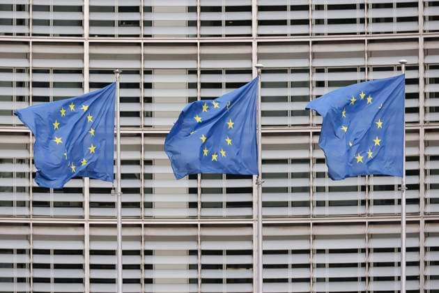 EU Flags In Brussels Flags of Europe as seen waving on a pole. The European Flag is the symbol of Council of Europe COE and the European Union EU as seen in the Belgian capital in front of the Le Berlaymont building, European Commission headquarters next to Forum Europa at the European Quarter in Brussels, where the headquarters of the pan-European institutions and organizations are located. Brussels, Belgium on October 21, 2022 Brussels Belgium  Copyright: xNicolasxEconomoux originalFilename: economou-notitle221021_np9Uy.jpg