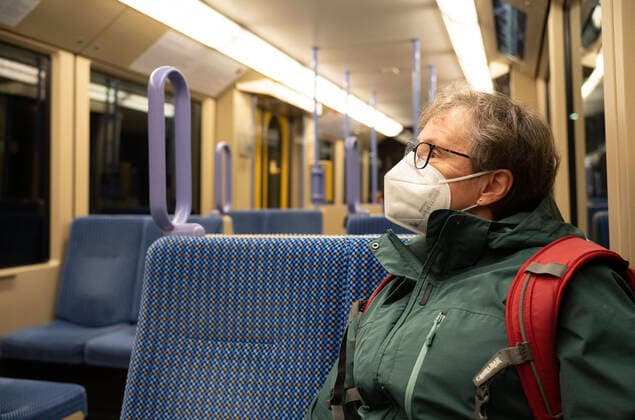 elderly woman with mouth mask, sitting in subway, corona crisis, Stuttgart, Baden Württemberg, Germany coronavirus