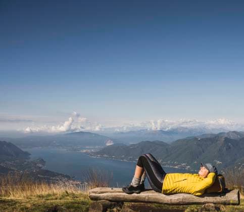 Mature woman wearing cap relaxing on bench model released, Symbolfoto, UUF27632