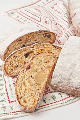 Slices of Christmas stollen cake on napkin, YDF00038