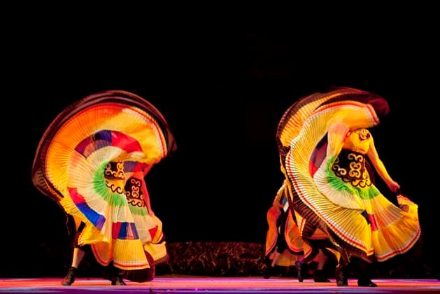 RECORD DATE NOT STATED CHENGDU - SEP 28: chinese Yi ethnic dancers perform on stage in the 6th Sichuan minority nationality culture festival at JINJIANG theater.Sep 28,2010 in Chengdu, China. , 3685315.jpg, music, woman, girl, lady, female, whirl, skirt, fashion, person, fitness, folk, dance, actor, actress, act, vitality, excited, hot, emotion, fervor, passion, passionate, ardor, jolly, active, intense, art, entertainment, glamor, perform, pretty, beauty, stylish, theater, vogue, young, pose, minority, ethnic, tribal, chinese, custom, traditional, retro, sexy, costume, dress, attire, finery, Yi nationality,