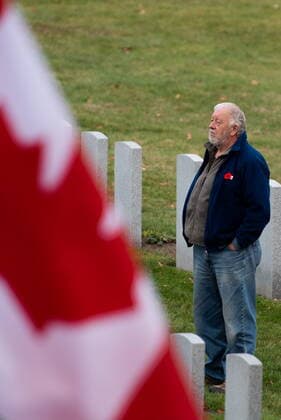 November 11, 2022, Ottawa, ON, Canada: A man looks on following Remembrance Day celebrations at the National Military Cemetery at Beechwood in Ottawa, Friday, Nov., 11, 2022. Ottawa Canada  - ZUMAc35_ 20221111_zaf_c35_058 Copyright: xSpencerxColbyx