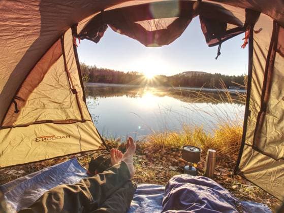 RECORD DATE NOT STATED Couple legs rest in tent at lake. Hiker enjoy view outsid and e free hike vacation, model released, , 37033424.jpg, activity, adventure, backpack, beautiful, boots, boyfriend, camping cooker, campsite, cooking breakfast, couple, dinner, feet, foam mat, forest, grass, hike, hiker legs, hiking, holiday, horizon, lake, landscape, man body, mountain, mountains, nail, naked foot, outdoor, pure nature, recreation, rest, scenery, sleeping bag, sleeping mat, socks, sunset, tent, thermos bottle, toes, together, tourism, tourist, travel, tread, trees, trekking, trip, vacation, water, waterproof