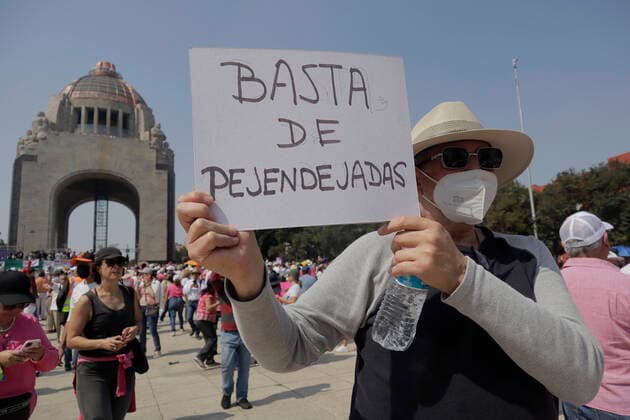 March For Democracy In Mexico A person holds a banner on the esplanade of the Monument to the Revolution in Mexico City, where various organizations, businessmen and people show their rejection of the electoral reform presented by the president of Mexico, AndrÃ s Manuel Lopez Obrador, who proposes to deliver fewer resources political parties, elect legislators in a system of electoral lists and that the selection of the electoral advisers of the National Electoral Institute (INE, for its acronym in Spanish), and the magistrates of the Electoral Tribunal be made by direct vote of the citizens. Mexico City Mexico  Copyright: xGerardoxVieyrax originalFilename: vieyra-notitle221113_npzeo.jpg