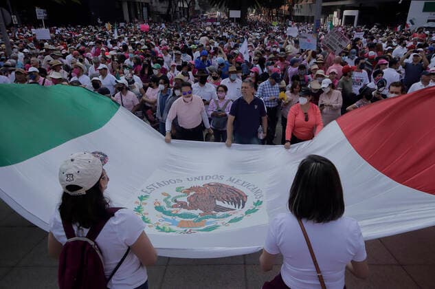 March For Democracy In Mexico A group of people waves a Mexican flag on the esplanade of the Monument to the Revolution in Mexico City, where various organizations, businessmen and people show their rejection of the electoral reform presented by the president of Mexico, AndrÃ s Manuel Lopez Obrador, who proposes giving less resources to political parties, electing legislators in a system of electoral lists and that the selection of the electoral advisers of the National Electoral Institute (INE, for its acronym in Spanish), and the magistrates of the Electoral Court be done by direct vote of citizens. Mexico City Mexico  Copyright: xGerardoxVieyrax originalFilename: vieyra-notitle221113_npoWR.jpg