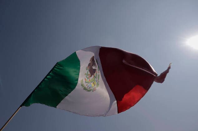 March For Democracy In Mexico A Mexican flag waves on the esplanade of the Monument to the Revolution in Mexico City, where various organizations, businessmen and people show their rejection of the electoral reform presented by the president of Mexico, AndrÃ s Manuel Lopez Obrador, who proposes to deliver fewer resources political parties, elect legislators in a system of electoral lists and that the selection of the electoral advisers of the National Electoral Institute (INE, for its acronym in Spanish), and the magistrates of the Electoral Tribunal be made by direct vote of the citizens. Mexico City Mexico  Copyright: xGerardoxVieyrax originalFilename: vieyra-notitle221113_npTbI.jpg