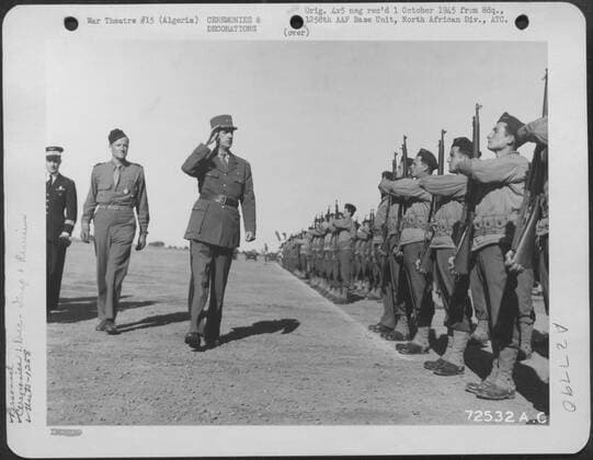 RECORD DATE NOT STATED General Charles De Gaulle inspects troops under his command at La Senia Airfield in Algeria, North Africa. 1258th AAF Base Unit, Air Transport Command. Copyright: xpiemagsx naramil3pie14102022-2367 !ACHTUNG AUFNAHMEDATUM GESCHÄTZT!