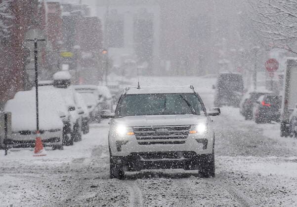 November 16, 2022, Montreal, PQ, Canada: A car makes its way along a snow covered street in Montreal, Wednesday, November16, 2022, as the first major snowfall hits the city. Montreal Canada  - ZUMAc35_ 20221116_zaf_c35_091 Copyright: xGrahamxHughesx