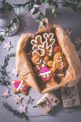 Gingerbread cookies for Christmas in cookie box with stars and small presents Gingerbread cookies for Christmas in cookie box with stars and small presents Copyright: xZoonar.com IngridxBalabanovax 17697903