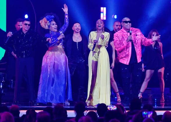 Goyo (C), Cuban singer Aymee Nuviola (L) and Gente de Zona perform onstage during the 23rd annual Latin Grammy Awards at the Michelob Ultra Arena at Mandalay Bay Resort and Casino in Las Vegas, Nevada on Thursday, November 17, 2022.  LAV20221117005 JIMxRUYMEN