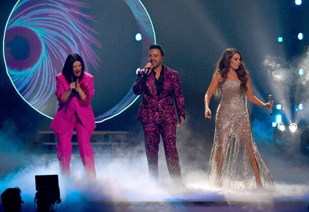 (L-R) Co-hosts Laura Pausini, Luis Fonsi and Thalía perform onstage during the 23rd annual Latin Grammy Awards at the Michelob Ultra Arena at Mandalay Bay Resort and Casino in Las Vegas, Nevada on Thursday, November 17, 2022.  LAV20221117616 JIMxRUYMEN