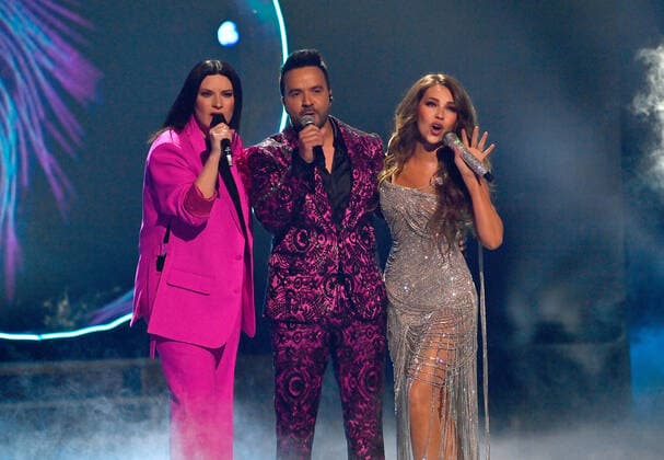(L-R) Co-hosts Laura Pausini, Luis Fonsi and Thalía perform onstage during the 23rd annual Latin Grammy Awards at the Michelob Ultra Arena at Mandalay Bay Resort and Casino in Las Vegas, Nevada on Thursday, November 17, 2022.  LAV20221117617 JIMxRUYMEN