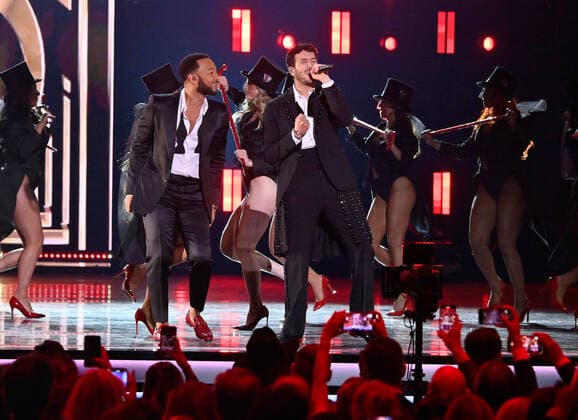 John Legend and Sebastián Yatra perform onstage during the 23rd annual Latin Grammy Awards at the Michelob Ultra Arena at Mandalay Bay Resort and Casino in Las Vegas, Nevada on Thursday, November 17, 2022.  LAV20221117680 JIMxRUYMEN