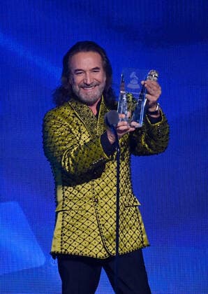 Honoree Marco Antonio Solís accepts the Person of the Year award onstage during the 23rd annual Latin Grammy Awards at the Michelob Ultra Arena at Mandalay Bay Resort and Casino in Las Vegas, Nevada on Thursday, November 17, 2022.  LAV20221117725 JIMxRUYMEN