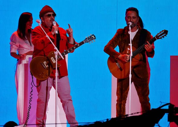 Elvis Costello (L) and Jorge Drexler perform during the 23rd annual Latin Grammy Awards at the Michelob Ultra Arena at Mandalay Bay Resort and Casino in Las Vegas, Nevada on Thursday, November 17, 2022.  LAV20221117070 JIMxRUYMEN