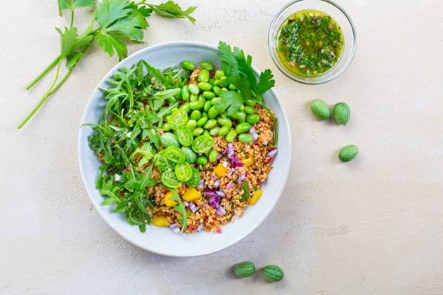 Healthy couscous salad with edamame beans Healthy couscous salad with edamame beans, rucola and cucamelon (Mexican miniature watermelon), with lemon and herbs dressing Copyright: xZoonar.com IngridxBalabanovax 18989839