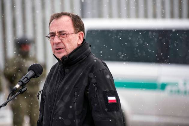 November 18, 2022, Nomiki, Podlaskie, Poland: Poland™s Interior Minister Mariusz Kaminski is seen during the press conference at the border wall near Nomiki village. Poland™s Interior Minister Mariusz Kaminski inspected the initial installation phase of high-tech monitoring equipment along a metal wall on the border with Belarus geared toward preventing thousands of migrants from crossing into the European Union..The head of the Ministry of Interior and Administration announced the completion of works on the first section of the electronic barrier on the border with Belarus. Kaminski also said that the 5.5-meter (17-feet) high wall has slashed crossing attempts tenfold. Nomiki Poland - ZUMAs197 20221118_zab_s197_040 Copyright: xAttilaxHusejnowx