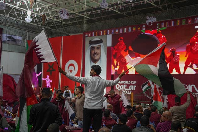 November 20, 2022, Gaza, Palestine: Thousands of Palestinians participated in attending the opening ceremony of the World Cup and attending the opening match between Qatar and Ecuador. The Qatari committee established a headquarters to display the matches throughout the World Cup for free in Saad Sayel Hall in the center of the Gaza Strip. The Palestinians in Gaza encouraged the national team And they sent motivational messages to the Qatari team via screens.  Copyright: xSaherxElghorrax