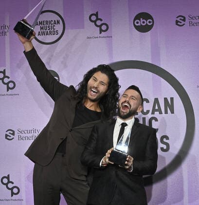 Dan Smyers and Shay Mooney of Dan + Shay, winner of the Favorite Country Duo or Group award appear backstage during the 50th annual American Music Awards at the Microsoft Theater in Los Angeles on Sunday, November 20, 2022.  LAP20221120829 JIMxRUYMEN