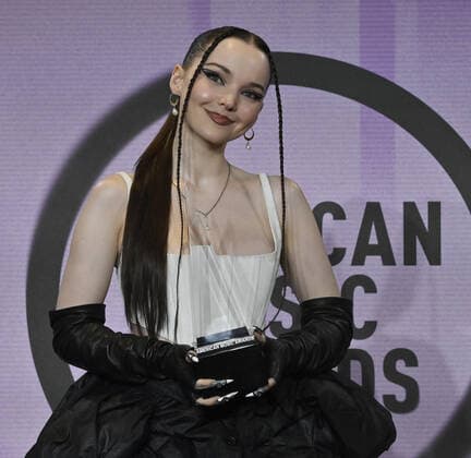 Dove Cameron, winner of the New Artist of the Year award appears backstage during the 50th annual American Music Awards at the Microsoft Theater in Los Angeles on Sunday, November 20, 2022.  LAP20221120831 JIMxRUYMEN