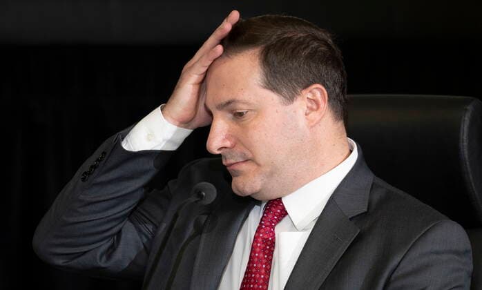 November 22, 2022, Ottawa, ON, Canada: Public Safety Minister Marco Mendicino fixes his hair as he reads a document while testifying at the Public Order Emergency Commission, Tuesday, November 22, 2022 in Ottawa. Ottawa Canada  - ZUMAc35_ 20221122_zaf_c35_018 Copyright: xAdrianxWyldx