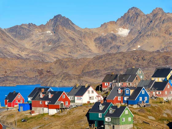 Town Tasiilaq (formerly called Ammassalik). the biggest town in East Greenland. America. Greenland.Tasiilaq. danish territory. Â¬ÂMartinZwick REDA&CO 1028_14_MZW15686