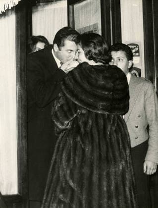 Empress Soraya Esfandiary-Bakhtiary of Iran and Prince Raimondo Orsini kissing her hand, Rome, Italy 1960s 