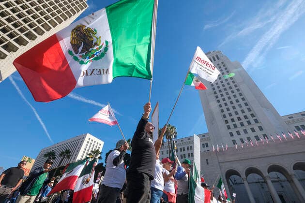 November 27, 2022, Los Angeles, California, USA: Members of the Full Rights for Immigrants Coalition take part in a rally to support political reform in Mexico, Sunday November 27, 2022 in Los Angeles. Los Angeles USA - ZUMAc68_ 20221127_zaf_c68_001 Copyright: xRingoxChiux