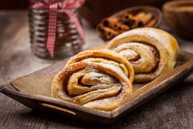 Homemade cinnamon rolls on wooden table Homemade cinnamon rolls on wooden table Copyright: xZoonar.com IngridxBalabanovax 7479476