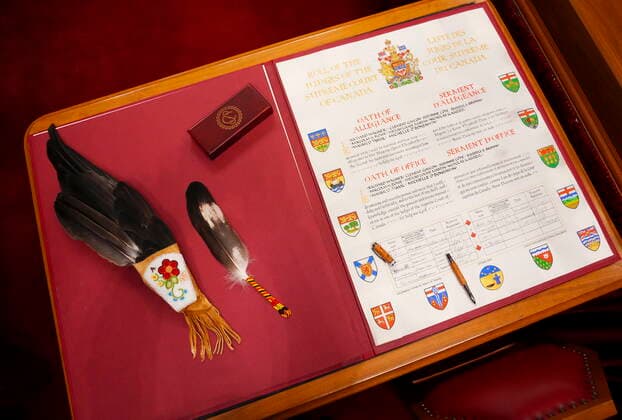 November 28, 2022, Ottawa, ON, Canada: Justice Michelle O Bonsawin s eagle wing, left, is pictured beside the Roll of The Judges of the Supreme Court of Canada after she signed it during her welcoming ceremony at the Supreme Court of Canada in Ottawa, on Monday, Nov. 28, 2022. O Bonsawin is the first Indigenous judge to be appointed to the Supreme Court of Canada. Ottawa Canada  - ZUMAc35_ 20221128_zaf_c35_047 Copyright: xSeanxKilpatrickx