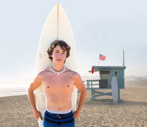 RECORD DATE NOT STATED Surfer boy teenager with surfboard in Santa Monica Lifeguard house California, model released, , 9212014.jpg, american, background, beach, blue, board, boy, california, carry, coast, flag, foreshore, guy, handsome, happiness, happy, hobby, holding, holiday, house, lifeguard, male, man, outdoor, people, portrait, pose, recreation, santa monica, sea, seaside, shore, sky, smiling, sport, summer, surf, surfboard, surfer, swimwear, teen, teenager, tropical, vacation, water, waves, white, young,