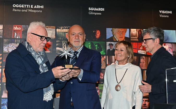 November 30, 2022, TURIN, Italia: Malcolm McDowell, Enzo Ghigo, president of the cinema museum, Rosanna Purchia and Domenico De Gaetano, director of the cinema museum, during the award ceremony for the Stella della Mole award to Malcolm McDowell at the cinema museum, in Turin, Italy, 30 November 2022. ANSA ALESSANDRO DI MARCO TURIN Italia - ZUMAa110 20221130_zaf_a110_044 Copyright: xAlessandroxDixMarcox