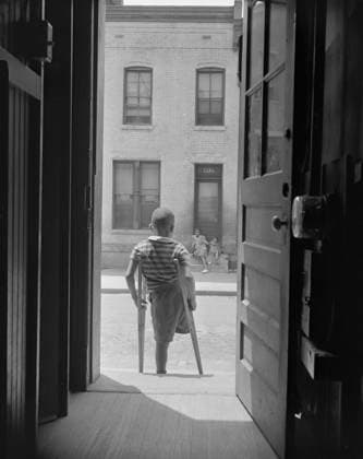RECORD DATE NOT STATED Young boy standing in the doorway of his home on Seaton Road...,Washington, D.C, 1942. Creator: Gordon Parks. Copyright:xHeritagexArt HeritagexImagesx IMAGO ,2902747 ! ACHTUNG: AUFNAHMEDATUM GESCHÄTZT!  Copyright:HeritagexArt HeritagexImagesx IMAGO