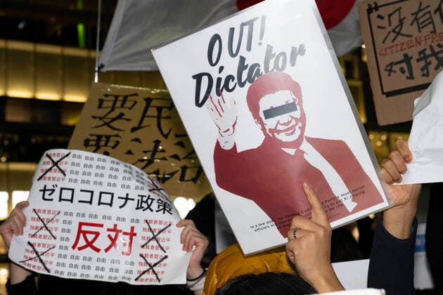 November 30, 2022, Tokyo, Japan: Tokyoites, Hong Kongers, Taiwanese, Uyghurs and Chinese dissidents protest outside Shinjuku Station against President Xi Jingping and the governing Chinese Communist Party s (CCP) draconian Zero-COVID policy after a fire in an ooeroÂ¼mqi, capitol of the Xinjiang Uyghur Autonomous Region, high rise building killed 10 people. Tokyo Japan - ZUMAb177 20221130_zap_b177_031 Copyright: xTaidghxBarronx