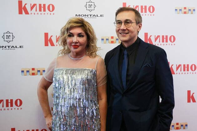 RUSSIA, MOSCOW - DECEMBER 1, 2022: Actress Marina Fedunkiv and director Nikolai Lebedev pose for a photograph during arrivals for the Sobytiye Goda Event of the Year 2022 award ceremony at the Illyuzion Cinema. The Event of the Year is an annual award presented by Kinoreporter Magazine for achievement in film and television. Sergei Karpukhin TASS  56199300