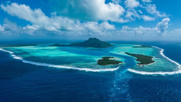 Aerial of the lagoon of Maupiti, Society Islands, French Polynesia, South Pacific, Pacific Copyright: MichaelxRunkel 1184-7443
