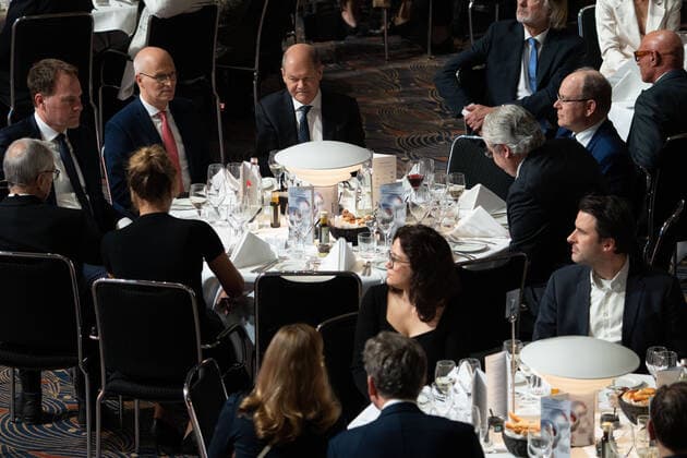 15 German Sustainability Award in Duesseldorf Olaf Scholz the Chancellor of the Federal Republic of Germany at the table in the event event together with Dr Peter Tschentscher the acting President of the Bundesrat, Dr Stephan Keller the Mayor of the City of Duesseldo