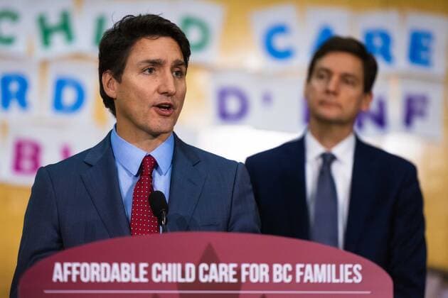 December 2, 2022, Vancouver, British Columbia, Canada: Canadian Prime Minister JUSTIN TRUDEAU, alongside British Columbia Premier DAVID EBY, announces the cost for licensed daycare in the province has dropped by an average of 50-per cent for qualifying families. B.C. was the first province to sign on to a federal child-care plan to slash costs to $10 per day, and in 2018 subsidized $350 per month for families to help reach those aims under the ChildCareBC plan. Trudeau and federal Minister of Families, Children and Social Development, Karina Gould met with Eby and B.C. Minister of State for Child Care Katrina Chen in Richmond, B.C. Dec. 2. Vancouver Canada - ZUMAb217 20221202_zip_b217_001 Copyright: xQuinnxBenderx