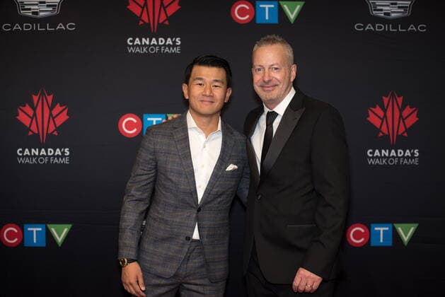 December 3, 2022, TORONTO, ON, CANADA: (L-R) Ronny Chieng, and Bruce Hills on behalf of 2022 inductee Just for Laughs, pose for a photograph on the red carpet for the 2022 Canada™s Walk of Fame Gala in Toronto, on Saturday, December 3, 2022. TORONTO CANADA  - ZUMAc35_ 20221203_zaf_c35_154 Copyright: xTijanaxMartinx