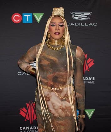 December 3, 2022, TORONTO, ON, CANADA: Tynomi Banks, poses for a photograph on the red carpet before performing at the 2022 Canada™s Walk of Fame Gala in Toronto, on Saturday, December 3, 2022. TORONTO CANADA  - ZUMAc35_ 20221203_zaf_c35_156 Copyright: xTijanaxMartinx