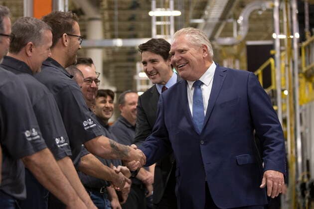 December 5, 2022, Ingersoll, Ontario, Canada: Prime Minister Justin Trudeau and Premier Doug Ford tour the General Motors CAMI assembly plant in Ingersoll, Ont., on Monday, December 5, 2022. Trudeau and Ford marked a Canadian milestone Monday, celebrating the launch of the country s first full-scale electric vehicle manufacturing plant. Ingersoll Canada  - ZUMAc35_ 20221205_zaf_c35_047 Copyright: xNicolexOsbornex