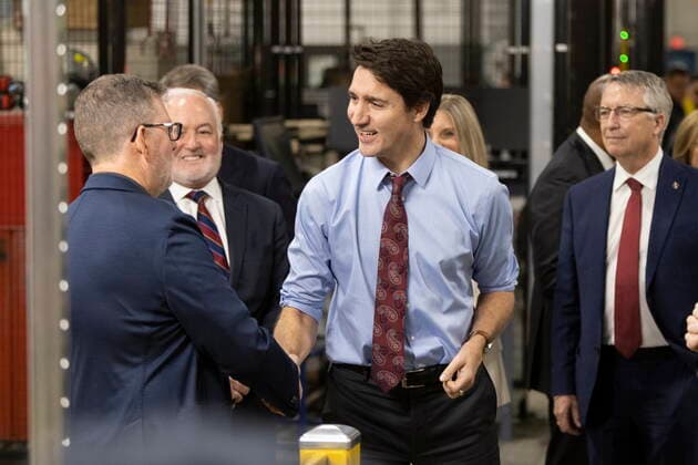 December 5, 2022, Ingersoll, Ontario, Canada: Prime Minister Justin Trudeau tours the General Motors CAMI assembly plant in Ingersoll, Ont., on Monday, December 5, 2022. Trudeau and Ontario Premier Doug Ford marked a Canadian milestone Monday, celebrating the launch of the country s first full-scale electric vehicle manufacturing plant. Ingersoll Canada  - ZUMAc35_ 20221205_zaf_c35_058 Copyright: xNicolexOsbornex