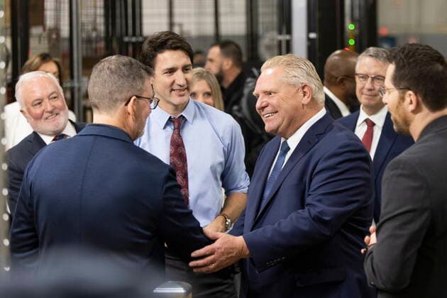 December 5, 2022, Ingersoll, Ontario, Canada: Prime Minister Justin Trudeau and Premier Doug Ford tour the General Motors CAMI assembly plant in Ingersoll, Ont., on Monday, December 5, 2022. Trudeau and Ford marked a Canadian milestone Monday, celebrating the launch of the country s first full-scale electric vehicle manufacturing plant. Ingersoll Canada  - ZUMAc35_ 20221205_zaf_c35_059 Copyright: xNicolexOsbornex