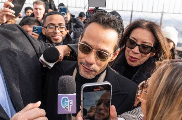 NY: Marc Anthony visits Empire State Building Marc Anthony speaks to press on observation deck during visit to Empire State Building. Marc Anthony helps to ceremonial lighting of ESB in gold on Maestro Cares golden anniversary. New York New York United States Copyright: LevxRadin