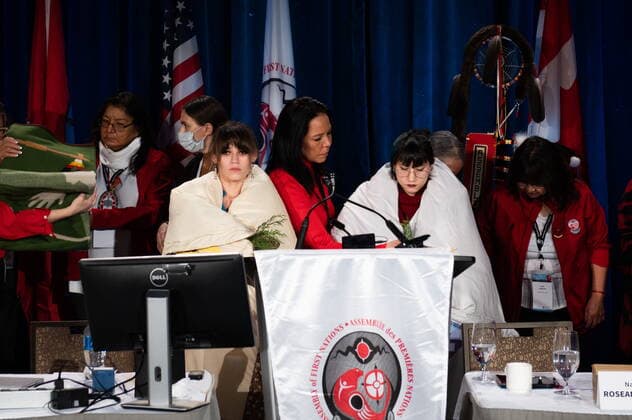 December 7, 2022, Ottawa, ON, Canada: Kera Harris, right, Cambria Harris, daughters of Morgan Harris, are blanked during the Assembly of First Nations (AFN) Special Chiefs Assembly (SCA) in Ottawa, on Wednesday, Dec. 7, 2022. Police have identified Morgan Harris as one of four women killed by an alleged serial killer in Winnipeg, but her body has not yet been found Ottawa Canada  - ZUMAc35_ 20221207_zaf_c35_125 Copyright: xSpencerxColbyx