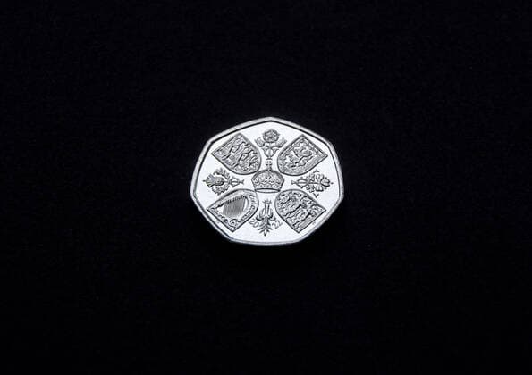 December 8, 2022, London, England, United Kingdom: The new 50p coin, with a portrait of King Charles III replacing Queen Elizabeth II, has been introduced into circulation in the UK, with the monarch now facing left, opposite to previous coins featuring The Queen. London United Kingdom - ZUMAv130 20221208_zip_v130_003 Copyright: xVukxValcicx