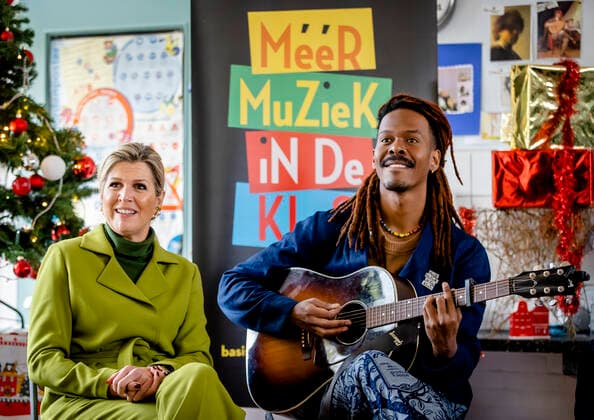 08-12-2022 Haarlem Queen Maxima with Jeangu Macrooy at the More Music in the Classroom at the OBS De Globe school, one of the participant in the largest school band in the Netherlands, in Haarlem. The Queen attended a music class by the Flying Brigadier, Andre Accord. Â  Copyright: xPPEx