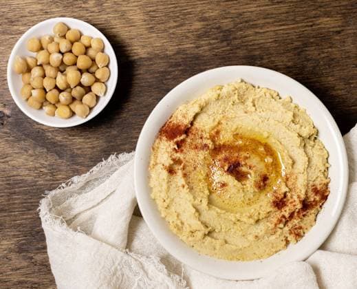IMAGO Creative, Food, Hummus top view bowl hummus with chickpeas. High quality and resolution beautiful photo concept top view bowl hummus with chickpeas. Resolution and high quality beautiful photo Copyright: xZoonar.com OleksandrxLatkunx 17851678