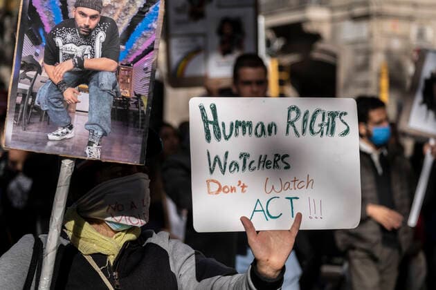 December 10, 2022, Barcelona, Catalonia, Spain: A protester holds a placard during the demonstration. Coinciding with Human Rights Day, hundreds of demonstrators have demonstrated in the center of Barcelona to protest against the repression of the Iranian regime and against the death sentences of those detained during the demonstrations. Barcelona Spain - ZUMAs197 20221210_zaa_s197_138 Copyright: xPacoxFreirex